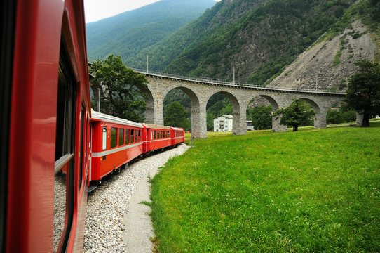 Bernina Express Train, Unesco world heritage. Bernina Express Train at Brusio on the Swiss alps