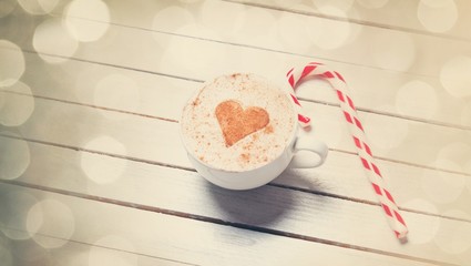 Cup of coffee and christmas candy