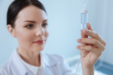 Selective focus of an IV drip bottle