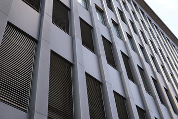 Bottom view of Berlin building facade with closed windows