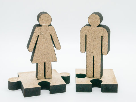 Wood carving men and women on white background.