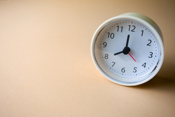 white clock on the ground