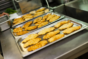 Chicken cutlet on a baking sheet