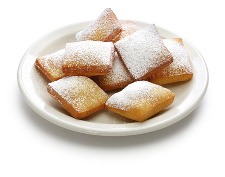 homemade new orleans beignet donuts isolated on white background