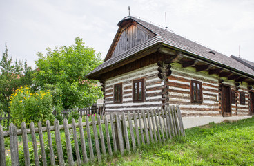 Wooden cottage in village