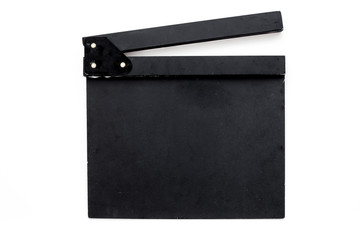 Filmmaker profession. Clapperboard on white background top view