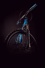 mountain bicycle photography in studio, cushioning bike frame parts, handle bar and brakes - obrazy, fototapety, plakaty