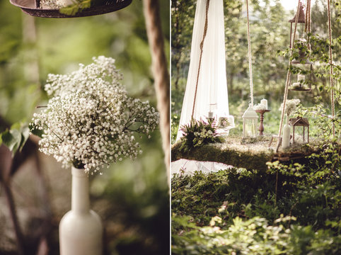 Wedding decor with flowers and candles in the forest