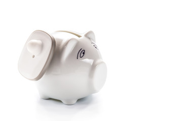 Anti-theft system tag on porcelain pig money box