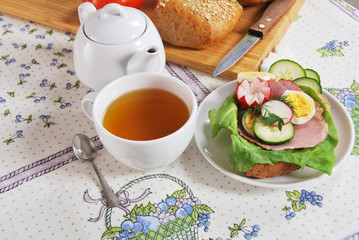 Sandwich with ham, egg, and radish made by grandma