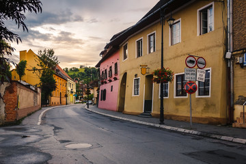 Street with houses in old european city Sighisoara at Romania