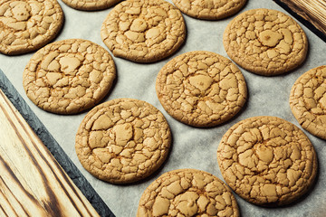 Biscuit sweet cookie background. Domestic stacked butter biscuit pattern concept,close up macro.Homemade cookies on wooden table.Cereal biscuits with the sesame,peanuts,sunflower and amaranth.