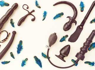 Different sex toys: dildo, prostate massager, vibrator, anal plug, handcuffs and others. Black...