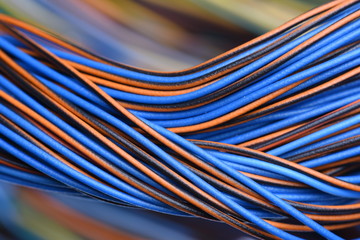 Closeup of colored cables and wires in computer network systems