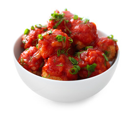 Bowl with delicious turkey meatballs and tomato sauce on white background