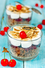 Trifle dessert with brownie, roasted marshmallow and cherry