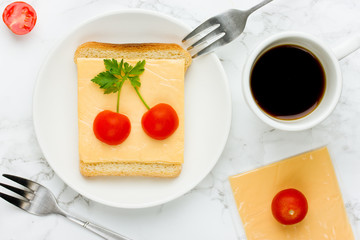 Sandwich with cheese, cherry tomatoes and parsley
