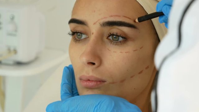 Young patient at plastic surgery clinic