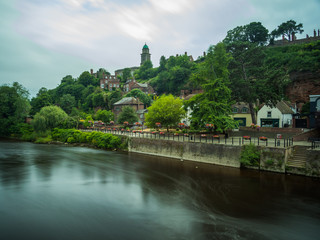 Fototapeta na wymiar View of Bridgnorth from the river Severn, long exposure. Bridgnorth, Shropshire, UK. 
