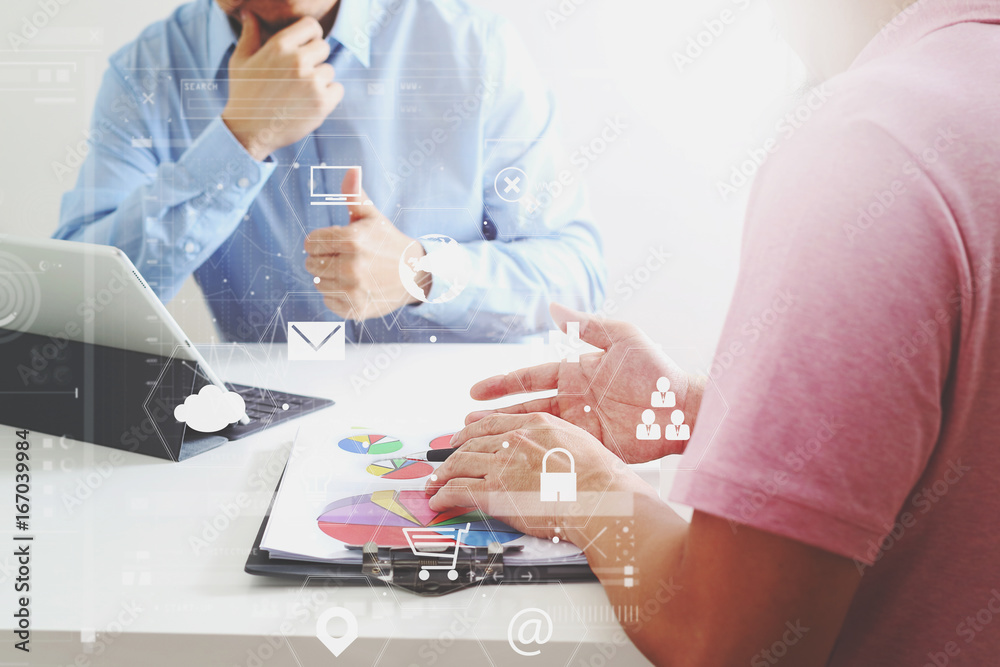 Poster Businessmen working together on a document and using smart phone and digital tablet and laptop computer in modern office with VR icon diagram