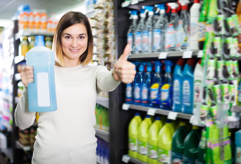 Female shopper searching for cleaners