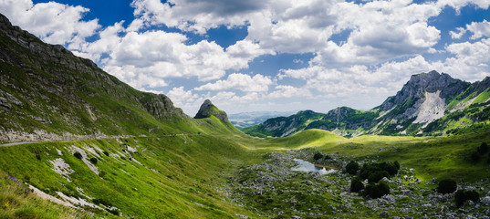 Naklejka premium View at the small lake in the middle of the mountain karst