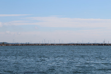 Fototapeta Wave breaks, wind farm obraz