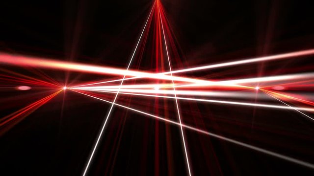 laser show from multi-colored rays of light in dark in disco. warning, laser beams dangerous for camera sensor