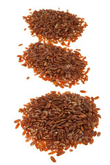 Red rice on white background