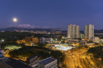 Fototapeta na wymiar Full moon over Hong Kong City