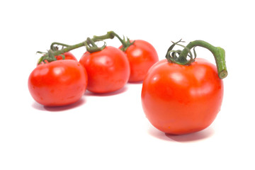Ripe natural red tomato isolated on white background.