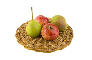 Apples and pears on a stand on a white background