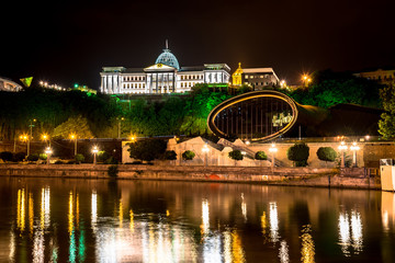 Fototapeta na wymiar Night view of Presidential palace and music and drama theatre in Rike park, Tbilisi, Georgia