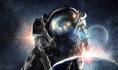 Astronaut explorer in space. Mixed media