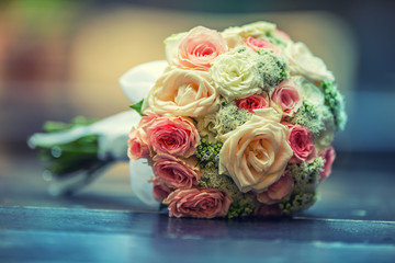Wedding bouquet.Wedding bouquet with roses on table