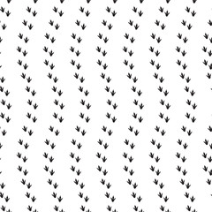 Minimal seamless pattern with dinosaur foots. Black and white colors. Vector illustration.