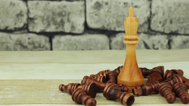 Big white king and small prostrate chess