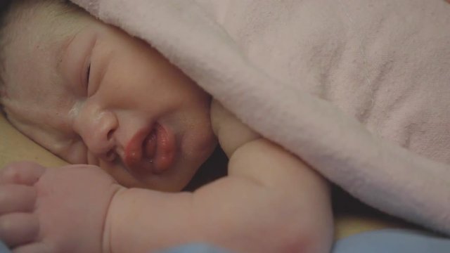 bew born baby caucassian happy
