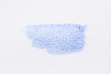 Abstract light blue watercolor on paper texture