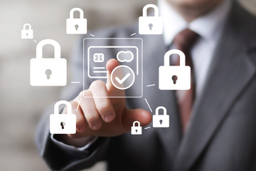Businessman pressing button credit card locked security network in internet.
