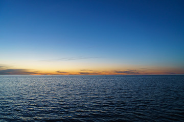 Fototapeta na wymiar Evening on the shore. Sunset.