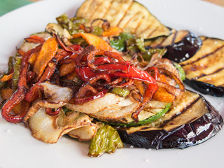 Colourful Pan fried vegetables, aubergine, egg plant, onions, peppers