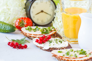 Sandwiches with ham and curd cheese for breakfast