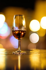 wine glass with blurred lights