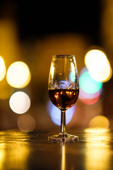 wine glass with blurred lights