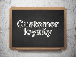 Advertising concept: Customer Loyalty on chalkboard background
