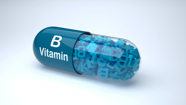 Blue pill or capsule filled with vitamin B.