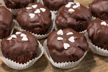 Cupcakes, muffins on a wooden table