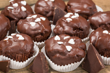 Cupcakes, muffins on a wooden table