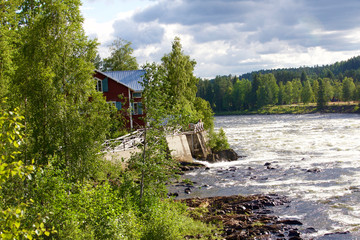 Maison au bord de la rivière